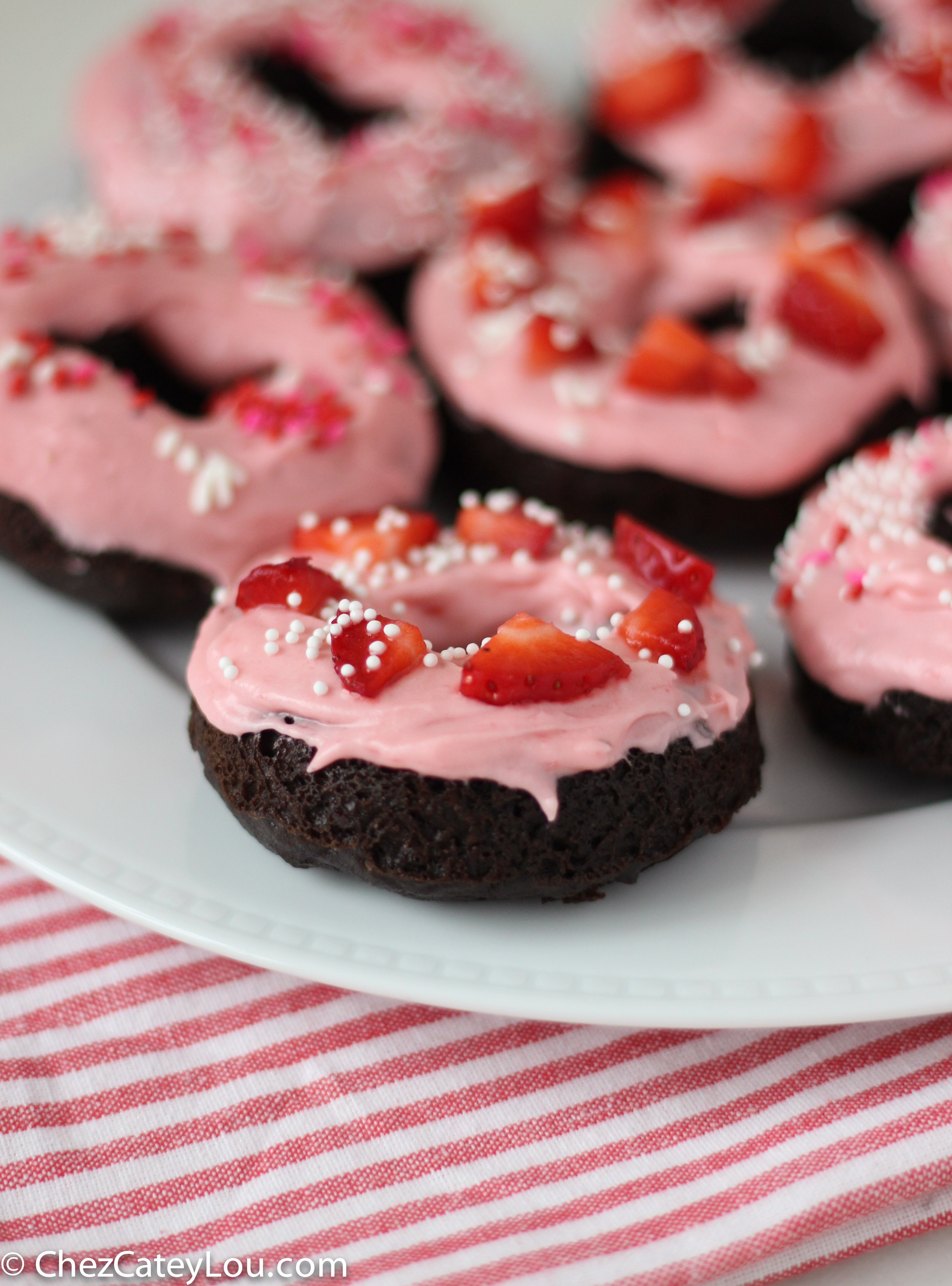 Chocolate Donuts with Strawberry Cream Cheese Icing - Chez CateyLou