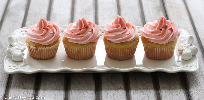 Baby Girl Cupcakes - yellow cupcakes with pink buttercream frosting | ChezCateyLou.com