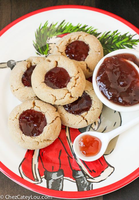 PBJ Thumbprint Cookies - the classic peanut butter and jelly flavor combo in a festive Christmas cookie! |ChezCateyLou.com
