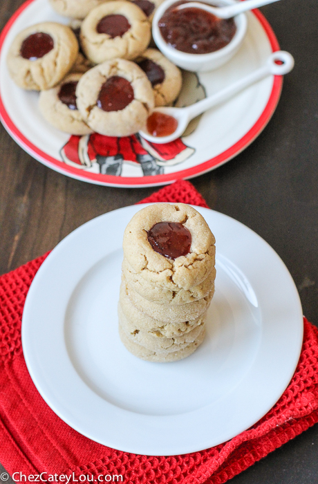 PBJ Thumbprint Cookies - the classic peanut butter and jelly flavor combo in a festive Christmas cookie! |ChezCateyLou.com