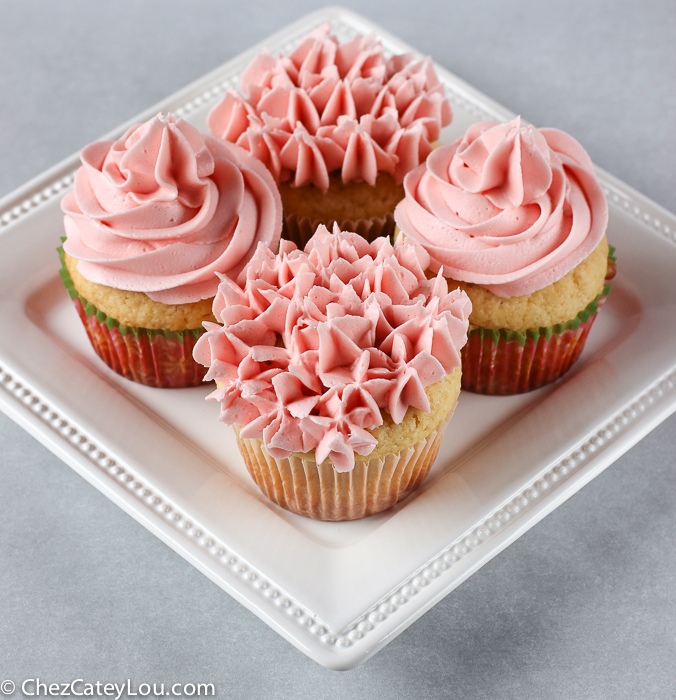 Baby Girl Cupcakes - yellow cupcakes with pink buttercream frosting | ChezCateyLou.com