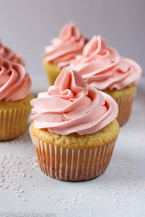 Baby Girl Cupcakes - yellow cupcakes with pink buttercream frosting | ChezCateyLou.com