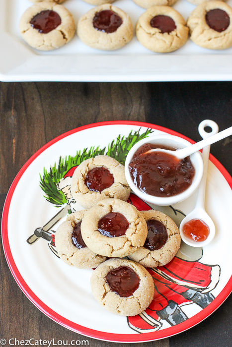 PBJ Thumbprint Cookies - the classic peanut butter and jelly flavor combo in a festive Christmas cookie! |ChezCateyLou.com